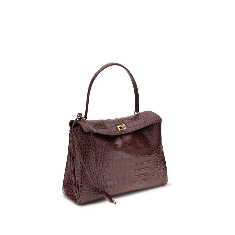 Balenciaga Brown Calf Leather Bos Taurus Handbag with crocodile-effect design, flap closure, and removable handle, AW25 collection.