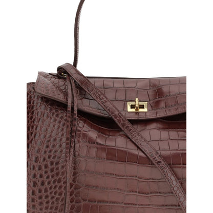 Balenciaga Brown Calf Leather Bos Taurus Handbag with crocodile-effect and dual compartment design, featuring a gold clasp detail.