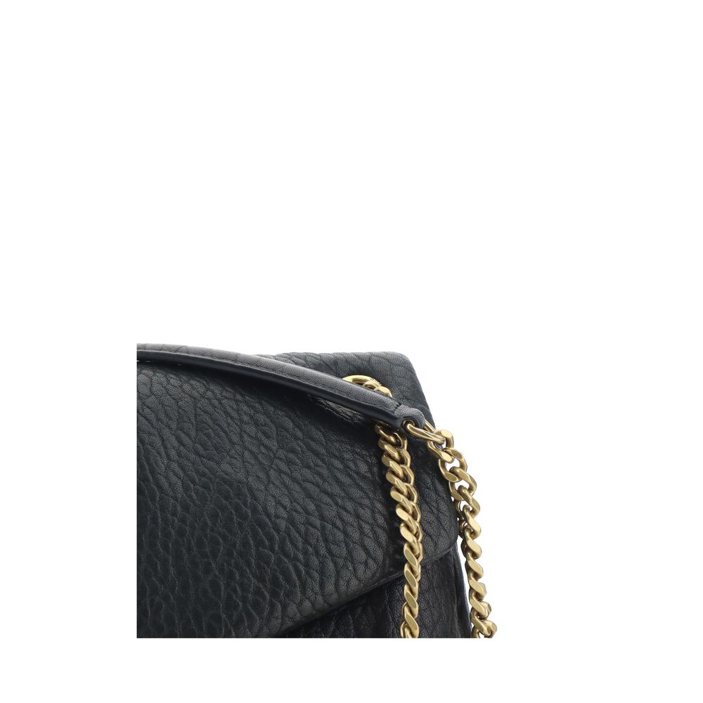 Close-up of the Saint Laurent Black Lamb Ovis Aries Aries Shoulder Bag with gold chain and grained leather texture.