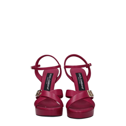 Dolce & Gabbana Pink Leather Platform Sandals with buckle closure, open toe, and high heel, featuring gold side logo.
