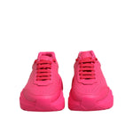 Dolce & Gabbana Pink Leather Daymaster Low Top Sneakers Shoes front view, featuring lace-up closure and rubber sole made in Italy.