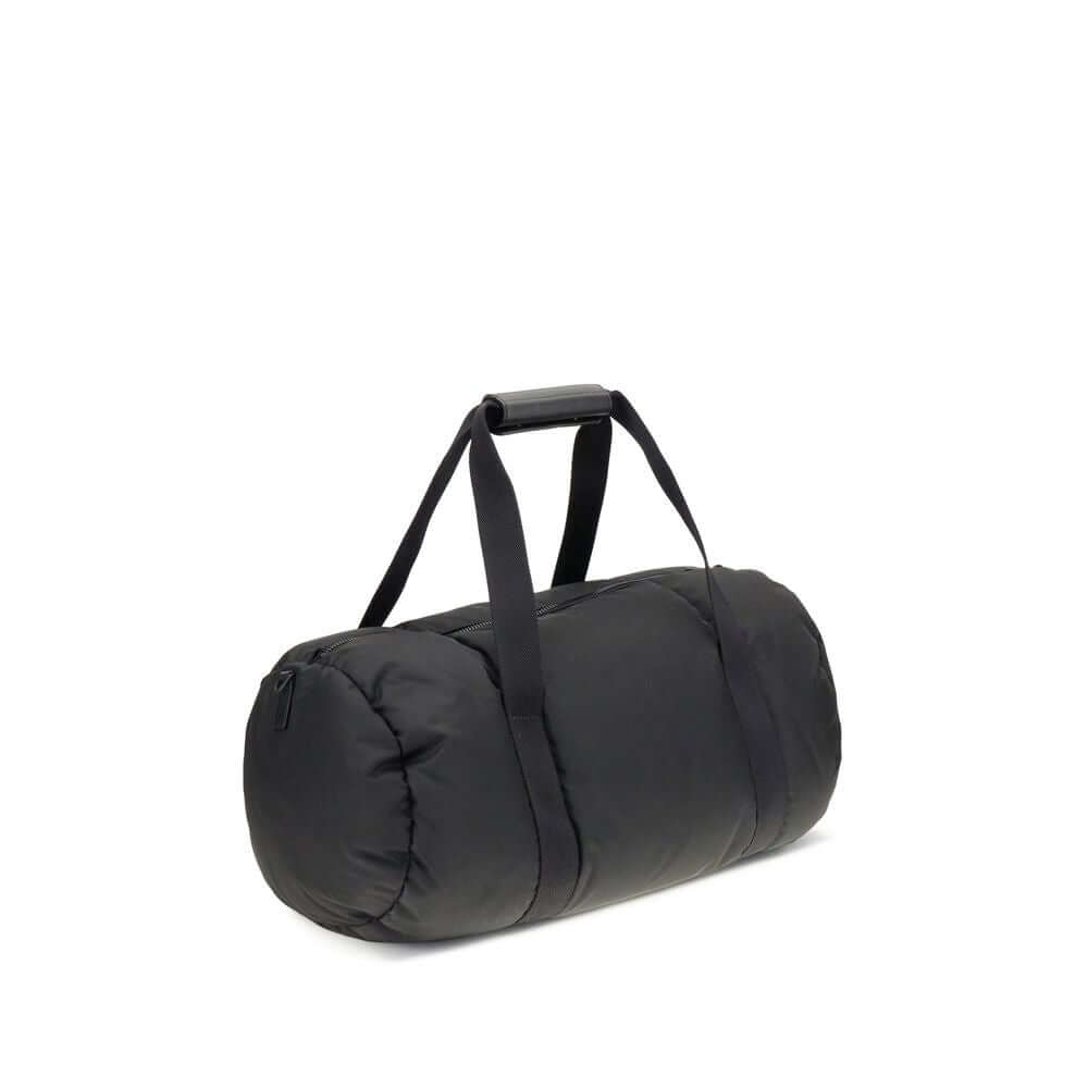 Moncler Black Nylon Luggage And Travel bag, sporty and elegant design with leather-tab handles and adjustable strap.