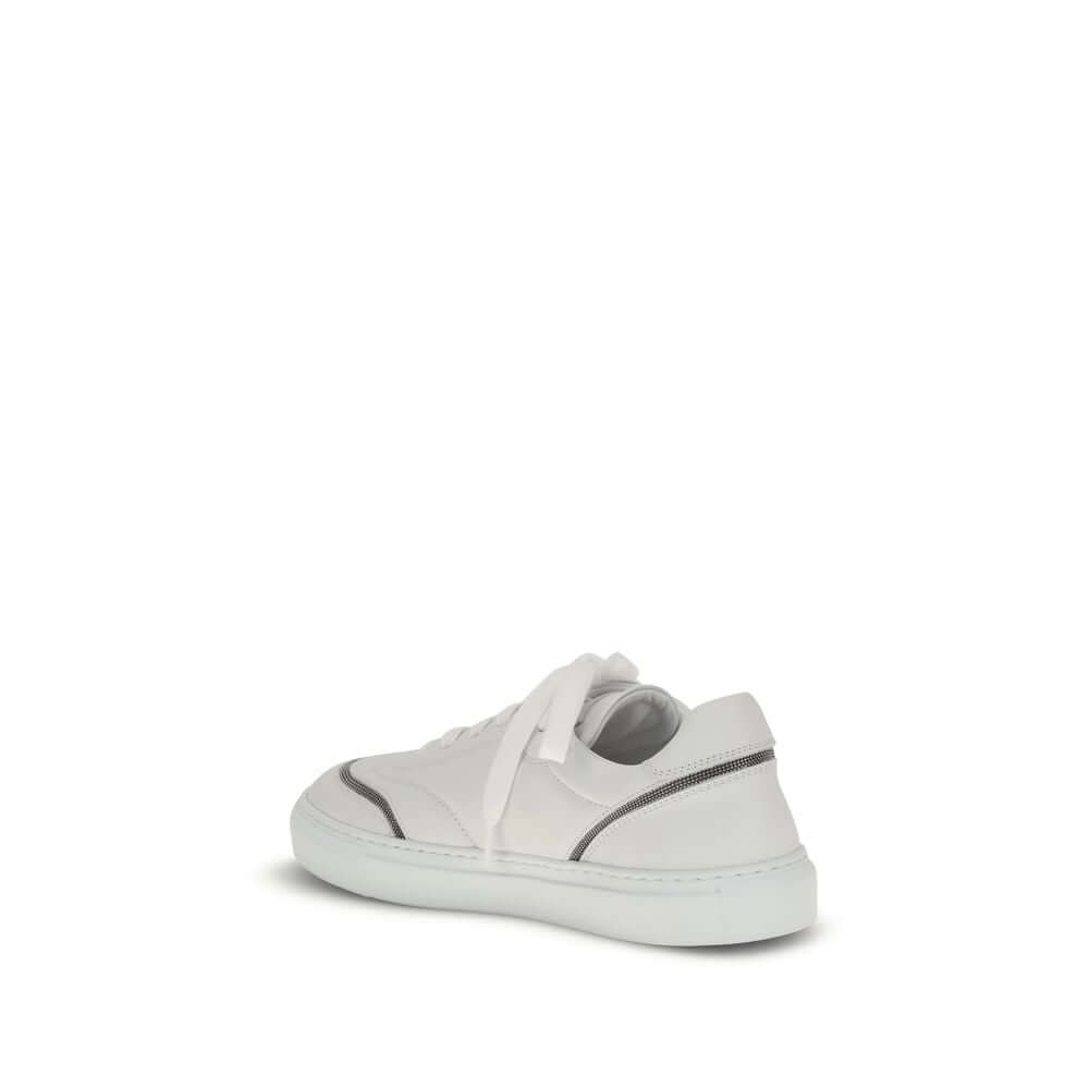 Brunello Cucinelli White Calf Leather Bos Taurus Low Top Sneakers with shiny monili detail and TPU rubber sole.