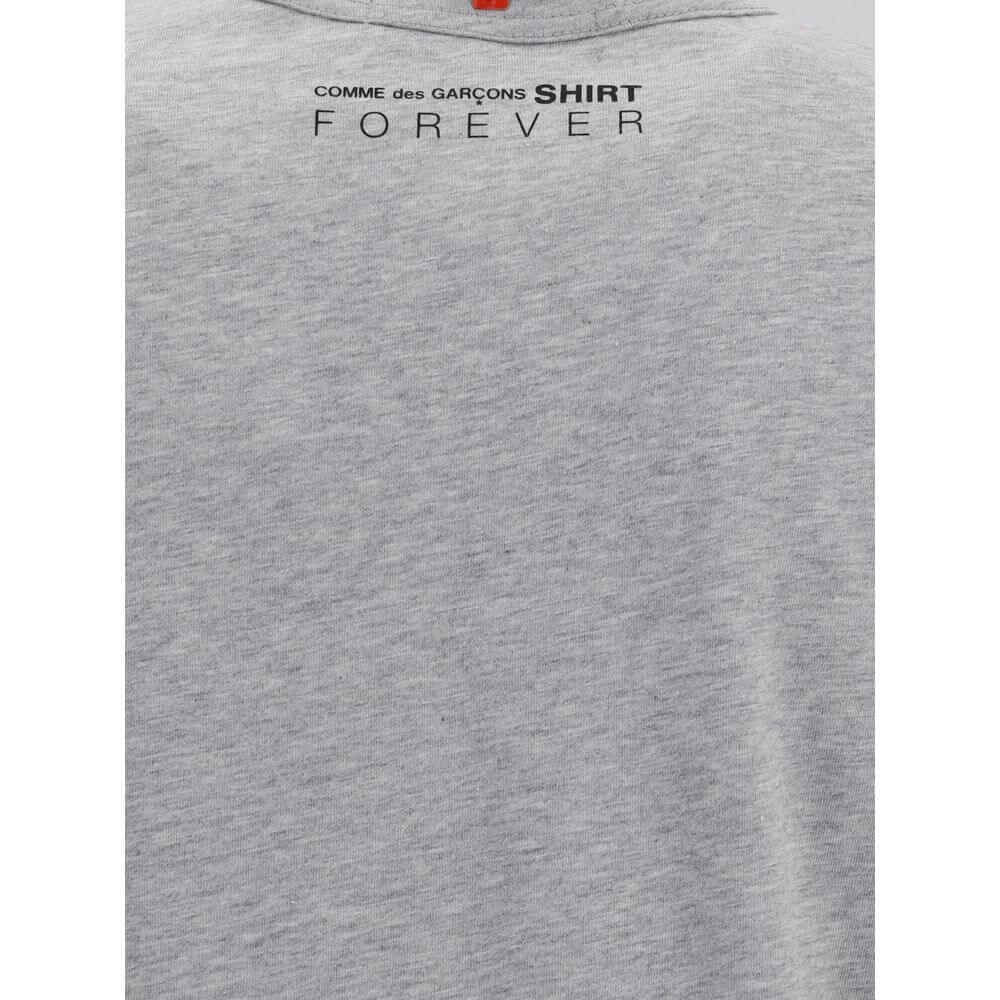 Comme Des Garçons Gray Cotton T-Shirt with printed logo on the back, featuring a minimalist design, regular fit, made in Turkey.