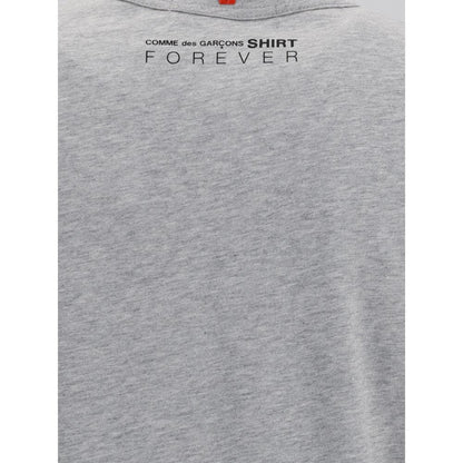 Comme Des Garçons Gray Cotton T-Shirt with printed logo on the back, featuring a minimalist design, regular fit, made in Turkey.