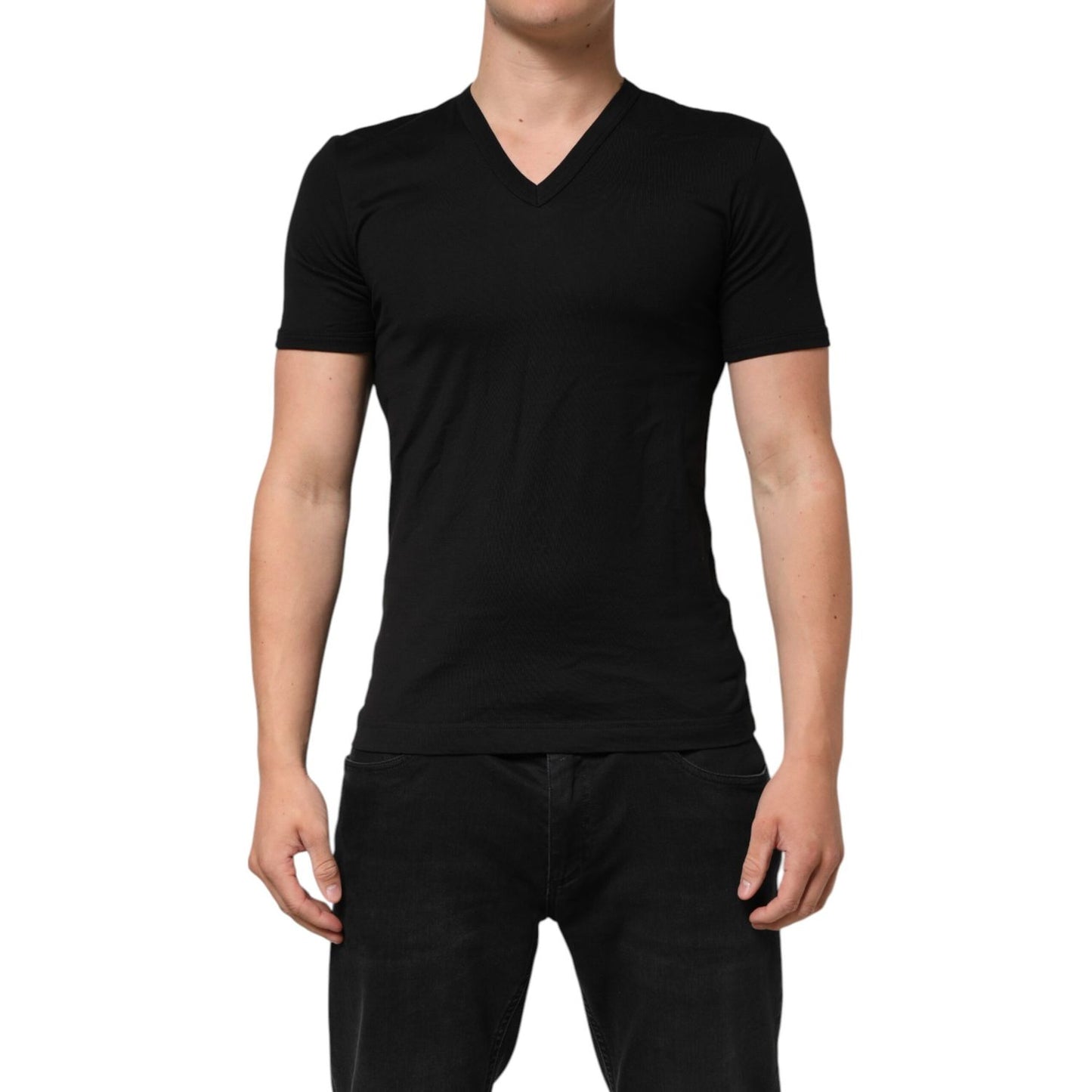 Model wearing Dolce & Gabbana Black Cotton Plain V-Neck Men Shirt T-shirt, short sleeves, regular fit, made in Italy.
