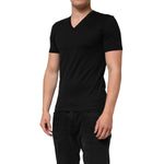 Dolce & Gabbana Black Cotton Plain V-Neck Men Shirt T-shirt, worn by model, showcasing regular fit and premium material.