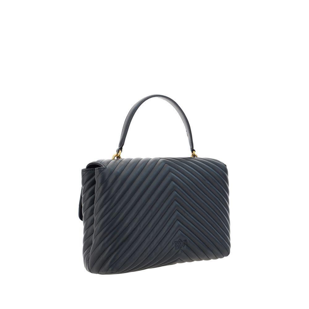 Front view with bag zipped and handles upright.
