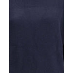Close-up of Allude Turtleneck Sweater in navy cashmere, showcasing soft texture and elegant design perfect for cold seasons.