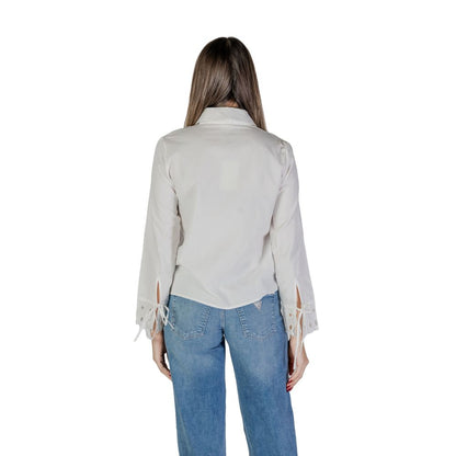 Back view of Jacqueline De Yong White Cotton Blouse with cut-out cuffs and traditional collar.