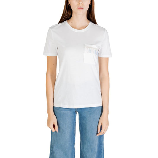 Woman wearing Only White Organic Cotton T-Shirt with pocket detail.