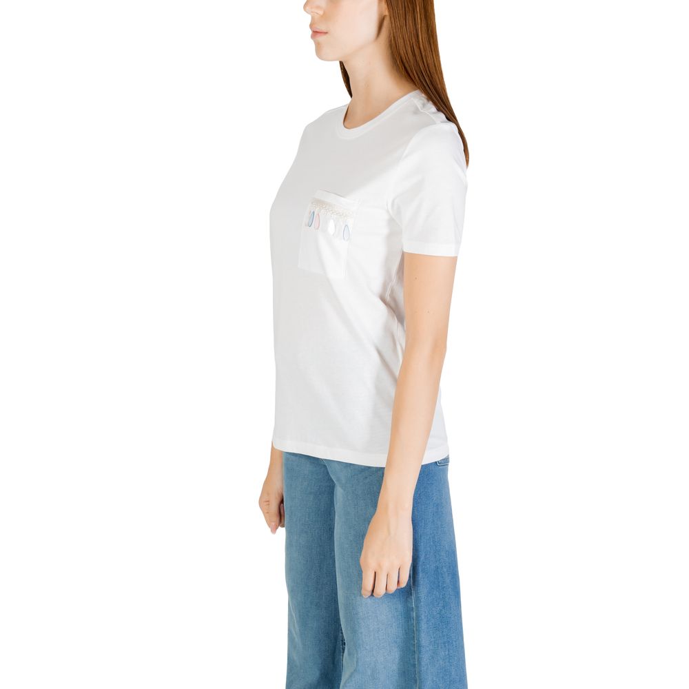 Side view of a woman wearing an Only White Organic Cotton T-Shirt with a chest pocket, paired with blue jeans.