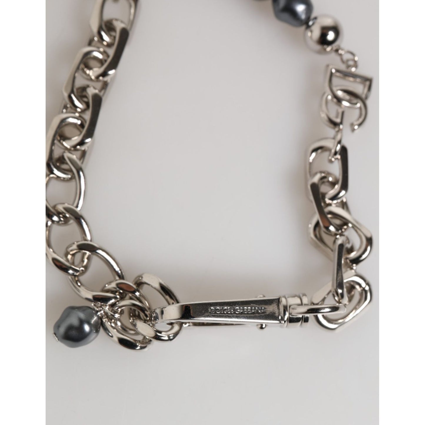 Dolce & Gabbana Silver Tone Chain Lobster Clasp Logo Gray Pearls Bracelet with intricate metal links and dark gray pearls.