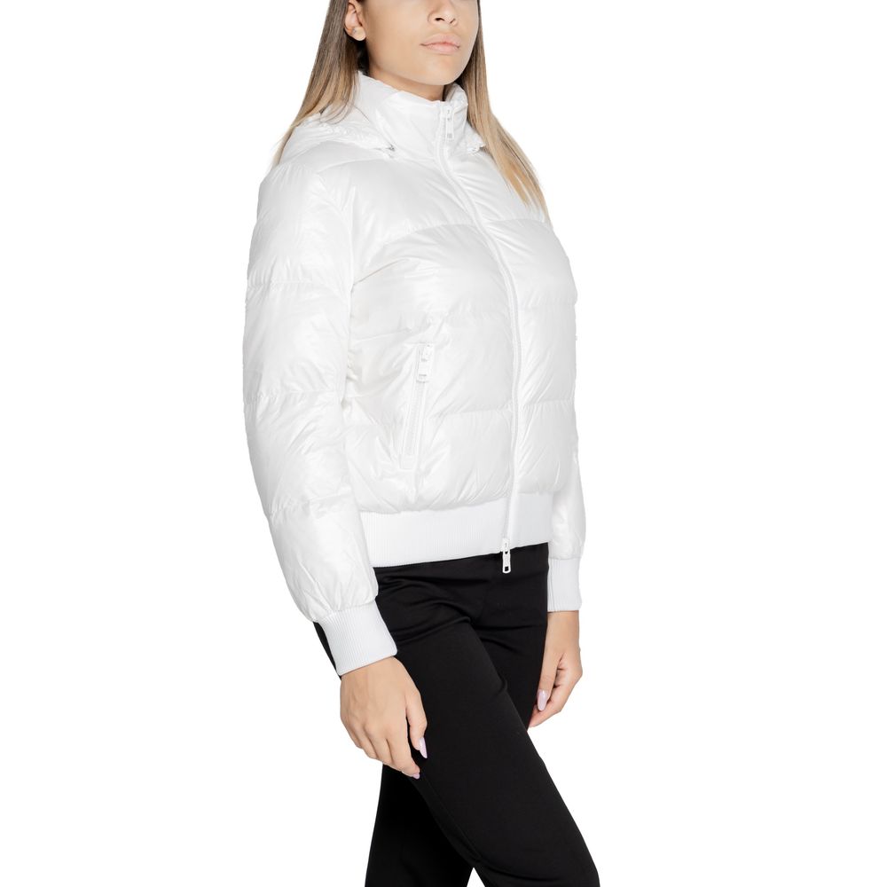 Woman wearing an Armani Exchange White Polyamide Coat with quilted design and AX logo on sleeve, showcasing style and functionality.