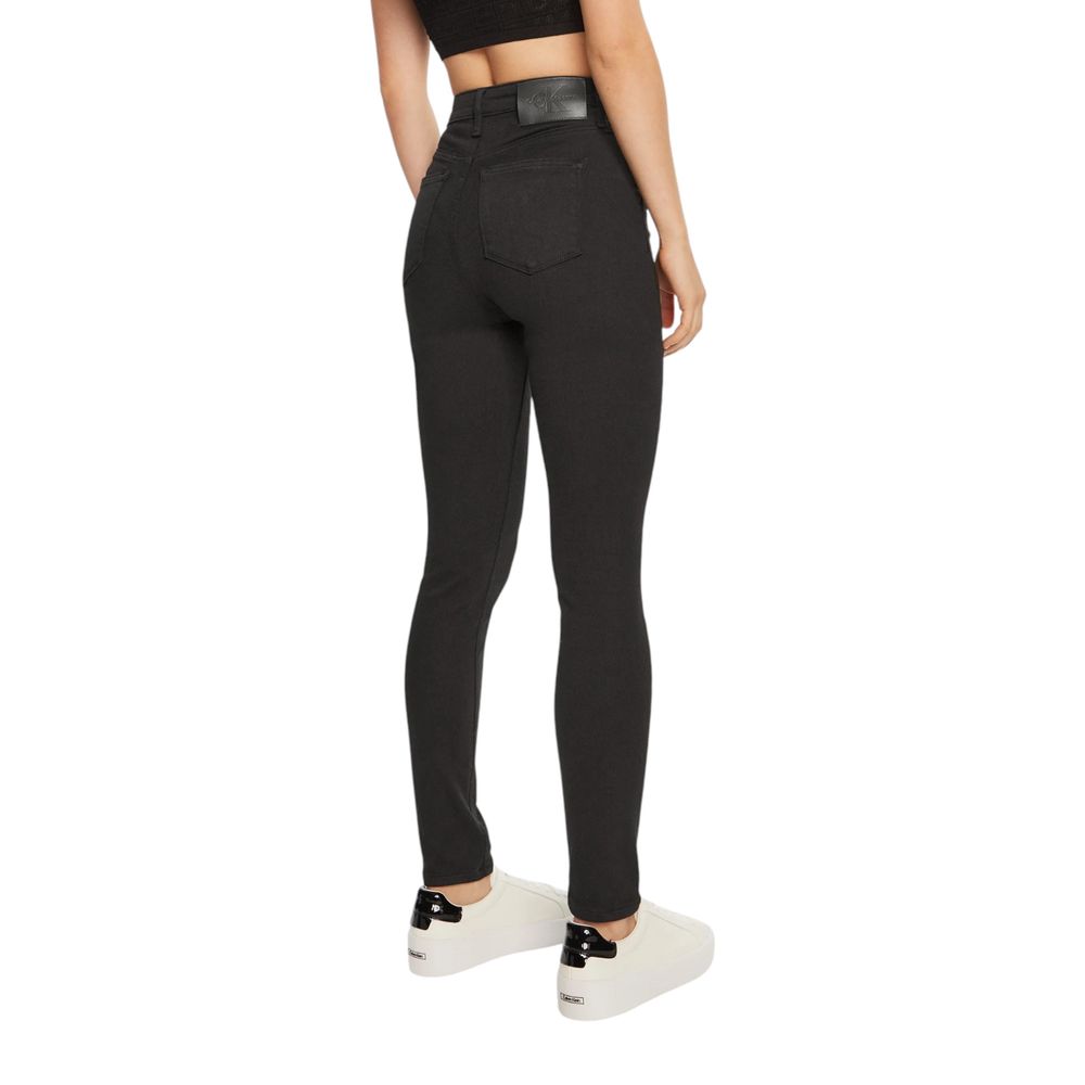 Back view of Calvin Klein Jeans Black Cotton Skinny Jeans showcasing high-rise and sleek silhouette for women.