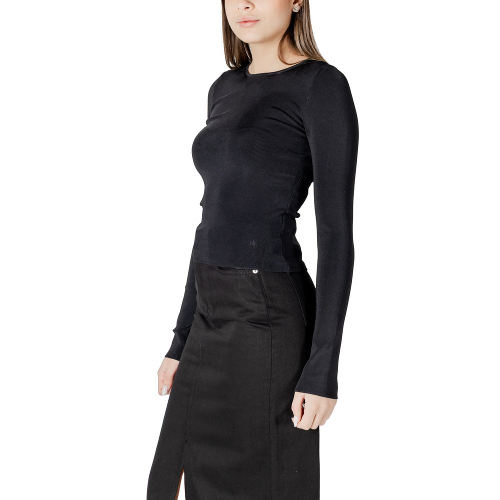 Model wearing Calvin Klein Jeans Black Rayon Shirt with cut-out details, perfect for casual and elegant occasions.