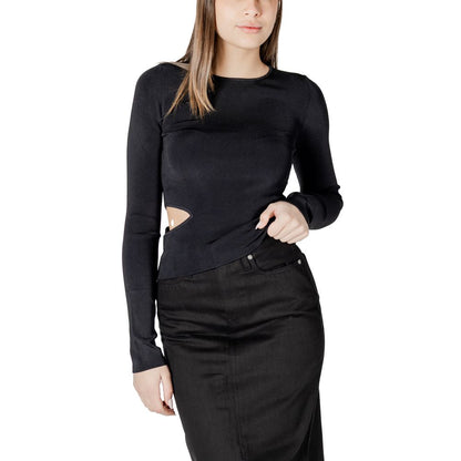 Woman wearing Calvin Klein Jeans Black Rayon Shirt with cut-out details, showcasing stylish design and comfortable fit.