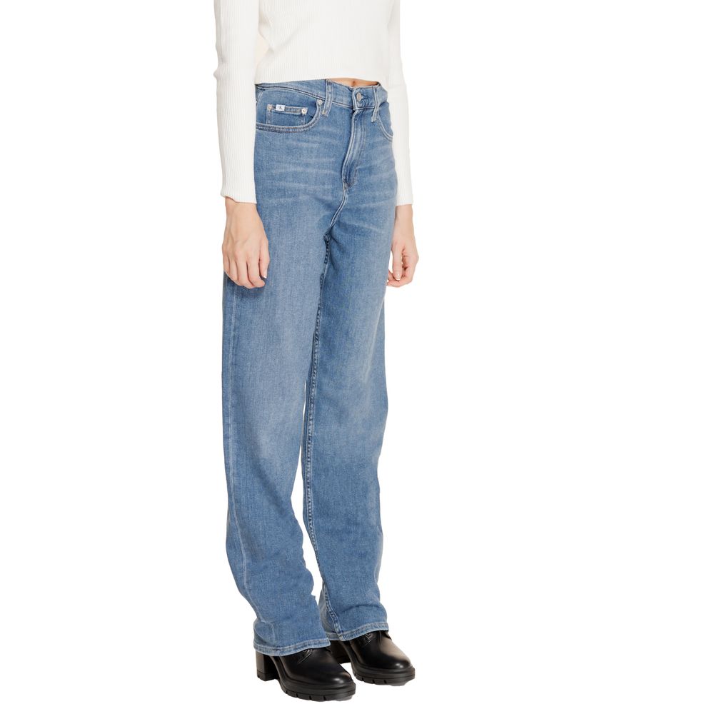 Woman wearing Calvin Klein Jeans Blue Cotton Relaxed Fit Jeans with high-rise waist and wide-leg for a contemporary look.