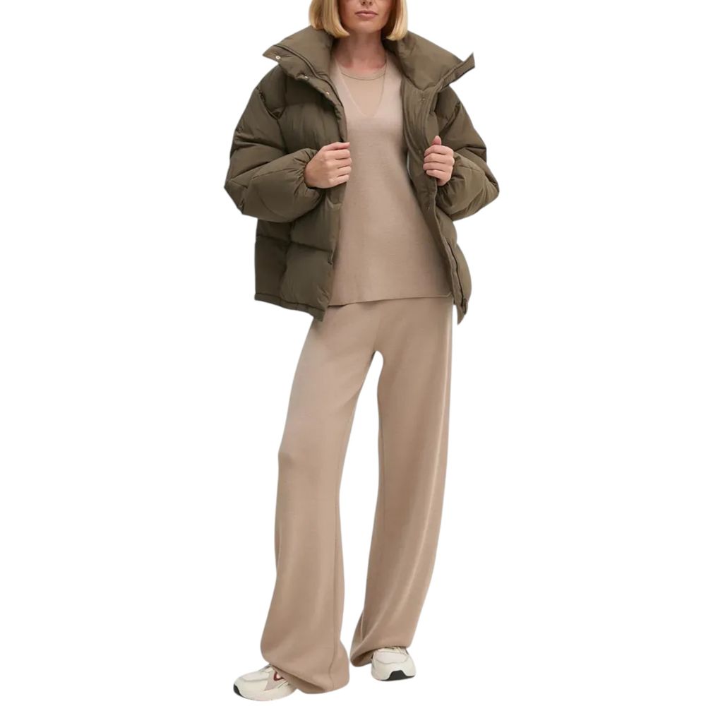 Woman wearing Calvin Klein Jeans Brown Polyester Coat and beige outfit
