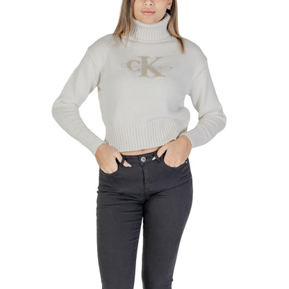 Calvin Klein Jeans Cream Cotton Turtleneck sweater with CK logo, featuring a ribbed design and modern cropped fit.