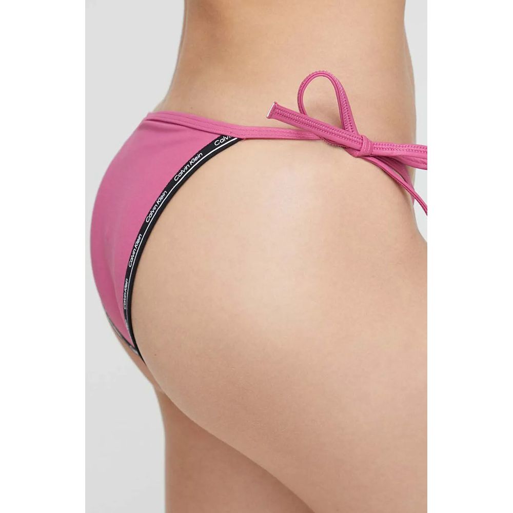 Calvin Klein Jeans Pink Polyester Swim Briefs with adjustable string side tie, perfect for a trendy and customizable beach look for women.
