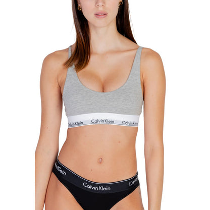 Calvin Klein Underwear Gray Cotton Bra on model, featuring modern design and comfortable fit, perfect for everyday wear.