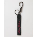 Dolce & Gabbana Black Burgundy Polyester DG Logo Men Keychain Keyring with polished metal hardware and sleek strap design.