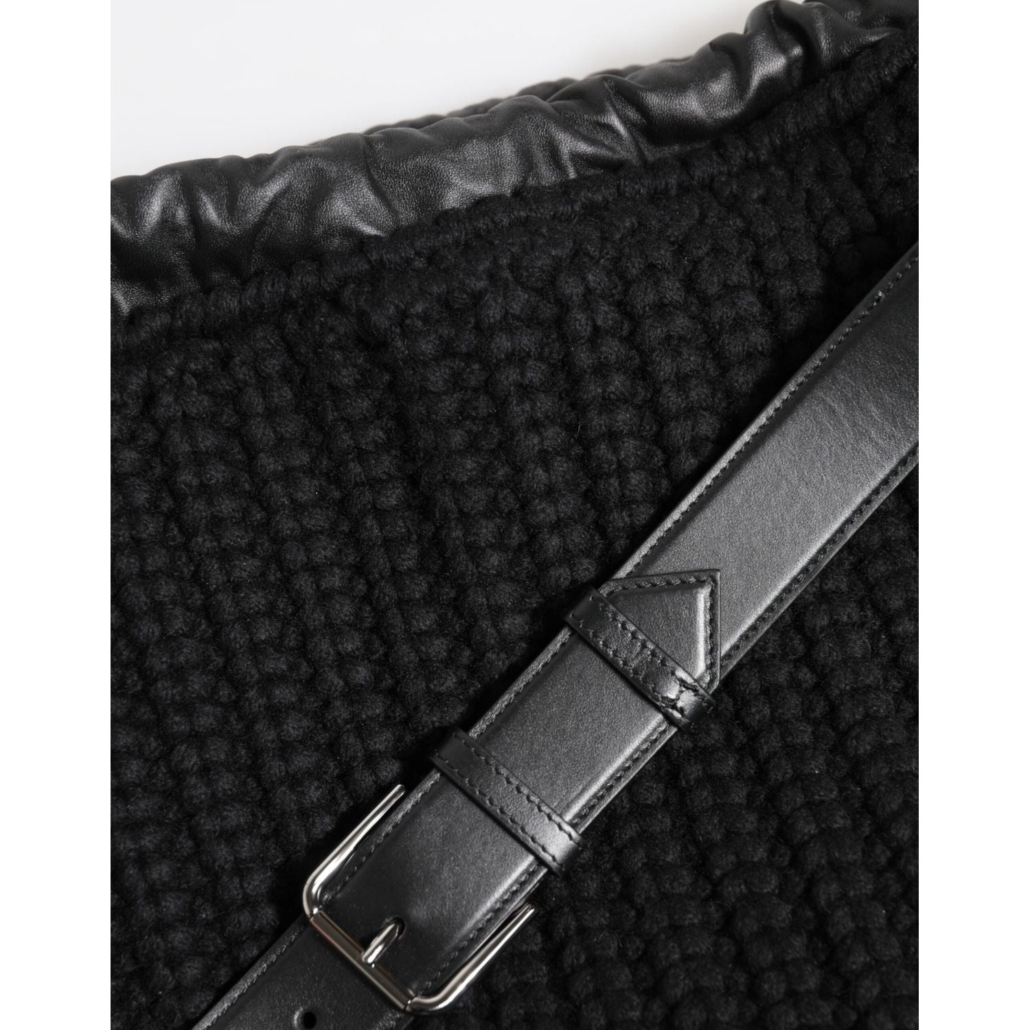 Front view with bag zipped and handles upright.