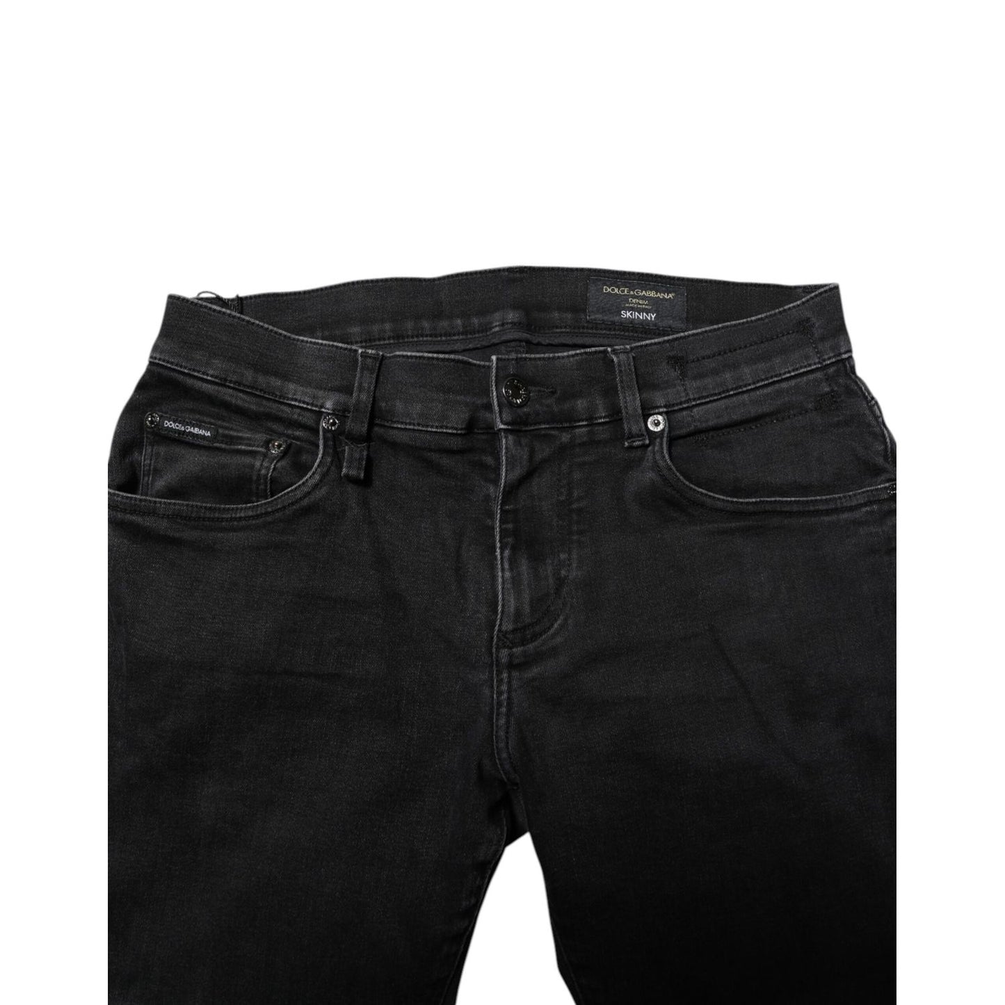 Dolce & Gabbana Black Cotton Skinny Men Denim Jeans with button closure and logo details, made in Italy.