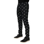 Dolce & Gabbana Black DG Monogram Cotton Skinny Denim Jeans with iconic logo design and sleek fit, showcasing luxury fashion branding.