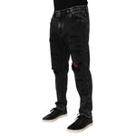Dolce & Gabbana Black Washed Ripped Loose Cotton Denim Jeans with distressed details and relaxed fit