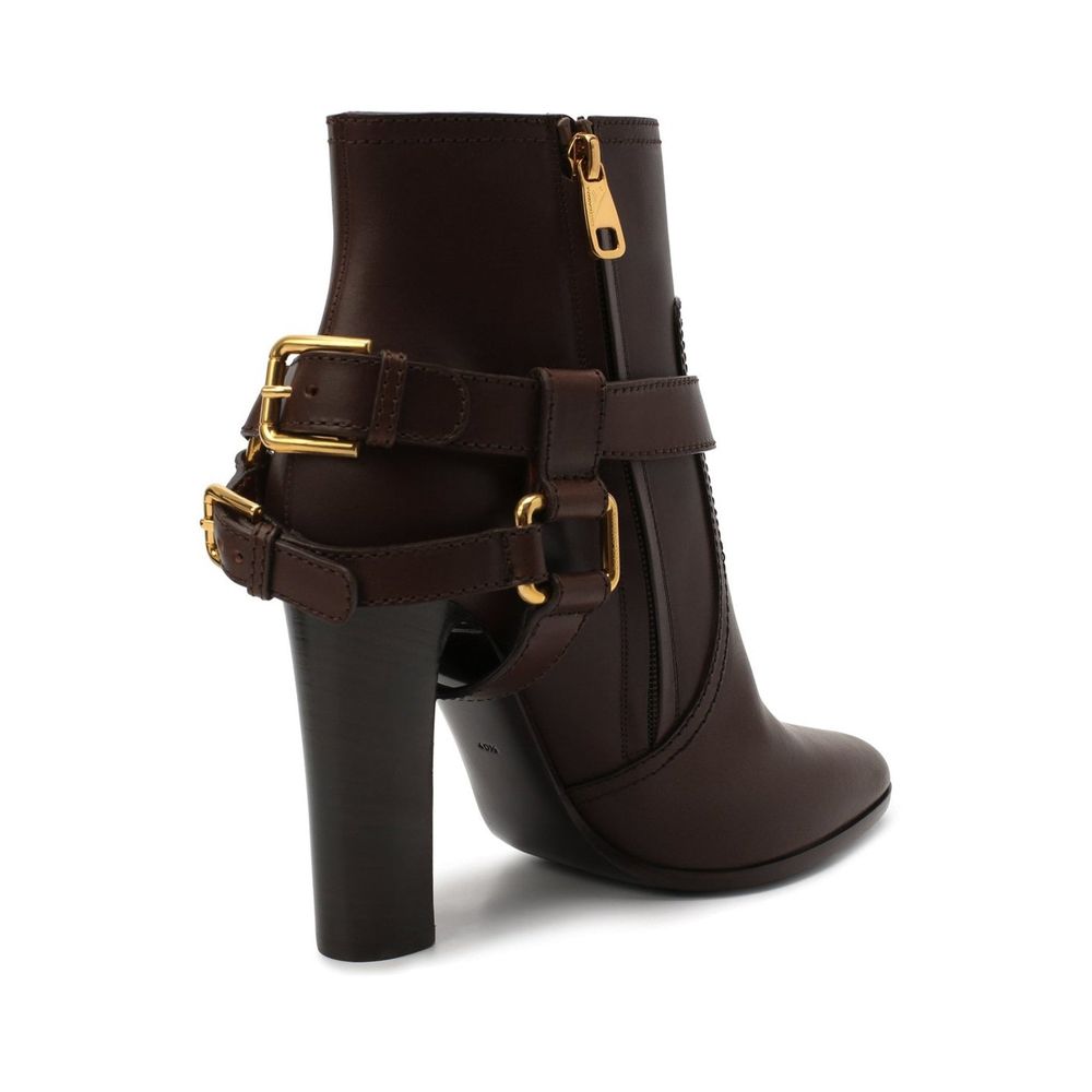 Dolce & Gabbana Brown Leather Ankle Boots with gold zip, detachable name tag, round toe, and 11 cm heel, made in Italy.