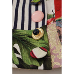 Close-up of Dolce & Gabbana Multicolor Patchwork A-line Polyester Skirt with button details and floral patterns.