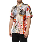 Model wearing Dolce & Gabbana Multicolor Shell Print Hawaii Casual Shirt, made of 100% silk with button closure, showcasing vibrant design.