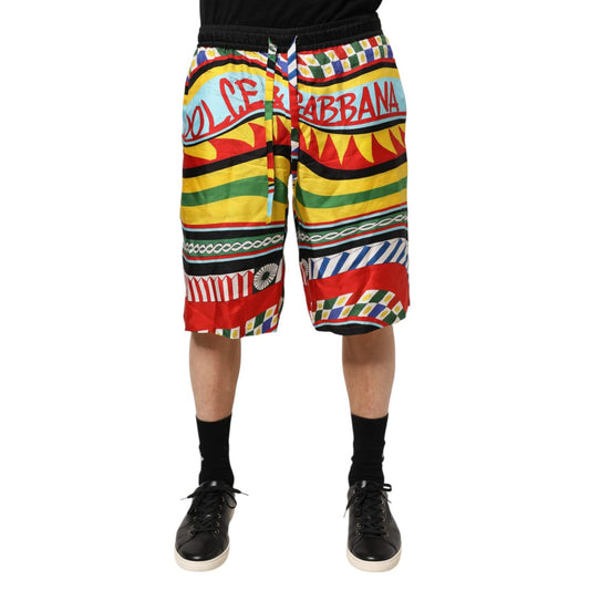 Dolce & Gabbana Multicolor Sicilian Carretto Shorts Swimwear with vibrant Sicilian Carretto print, drawstring, and luxury design.