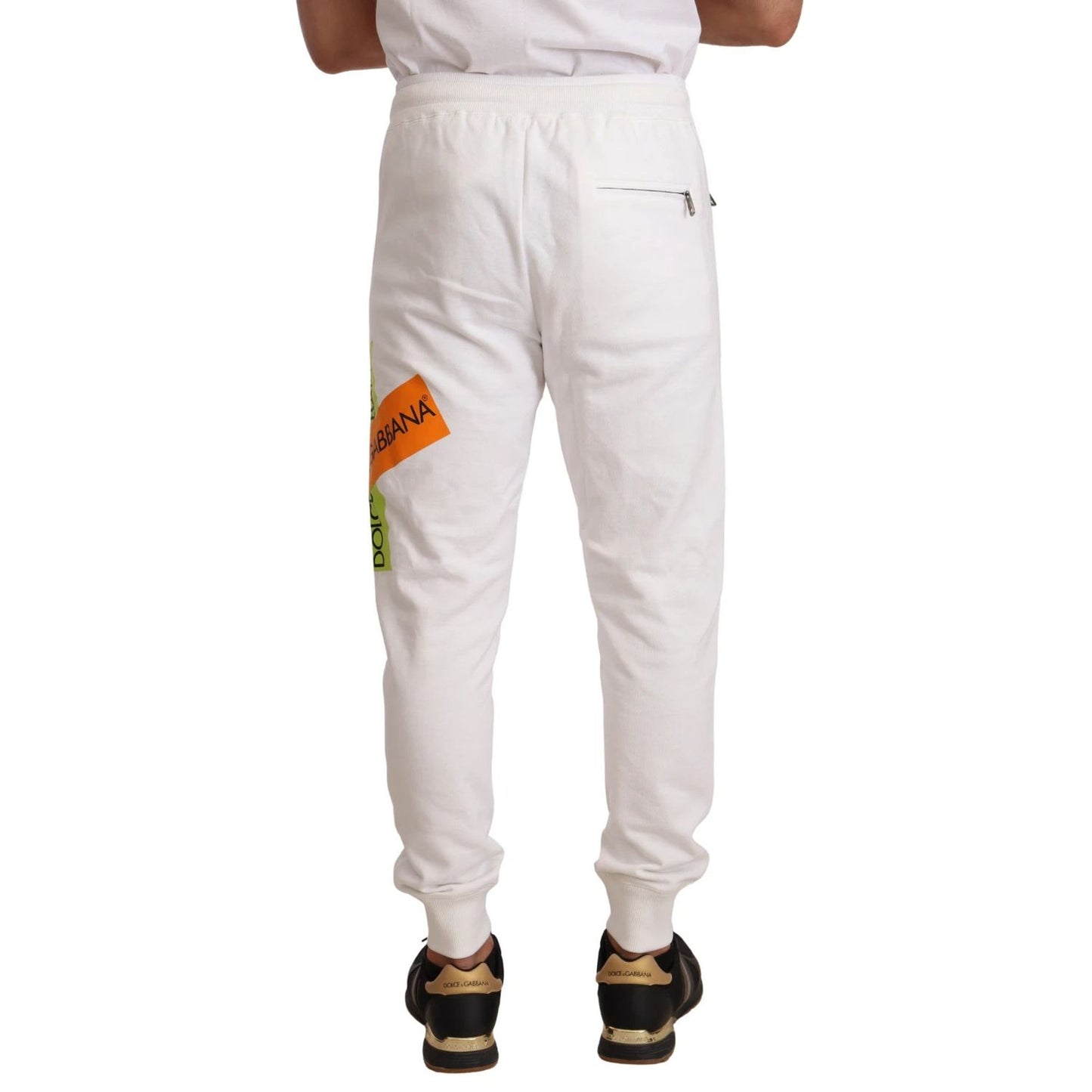 Rear view of Dolce & Gabbana White Cotton Logo Patch Sweatpants Jogging Pants with elastic waistband and back pocket.