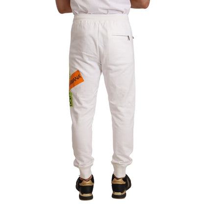 Rear view of Dolce & Gabbana White Cotton Logo Patch Sweatpants Jogging Pants with elastic waistband and back pocket.