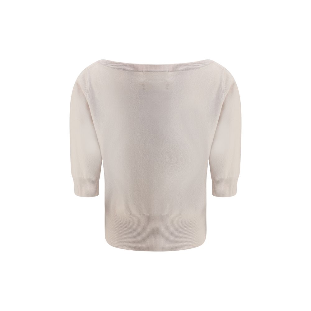 Rear view of Extreme Cashmere Cream Cashmere Cashmere Sweater featuring ribbed hem and elbow-length sleeves in cream color.