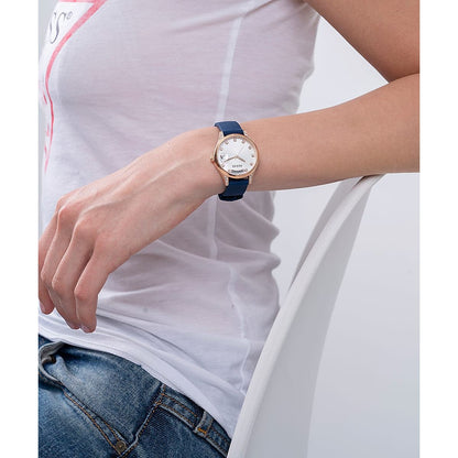 Person wearing a watch, showcasing the design and fit on wrist.