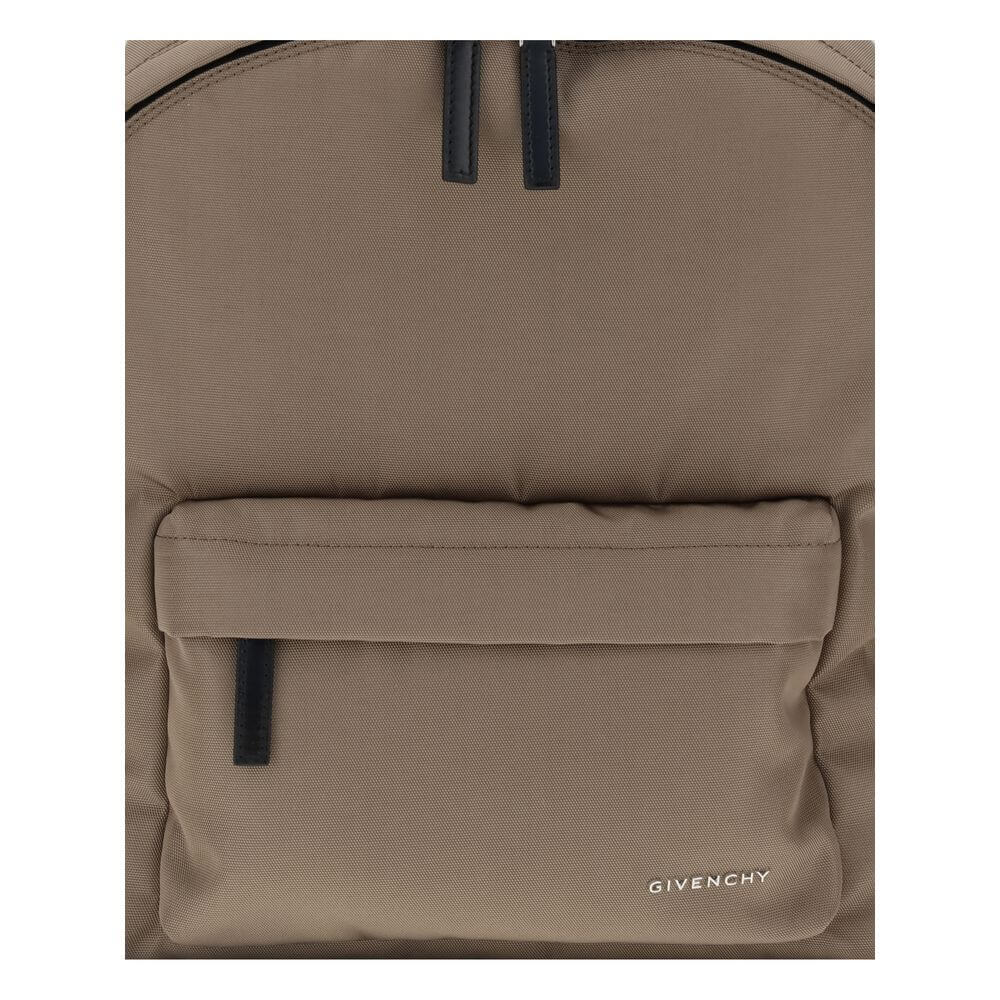 Givenchy Brown Polyamide Backpack with front zip pocket and metal GIVENCHY logo, featuring padded straps for comfort and style.