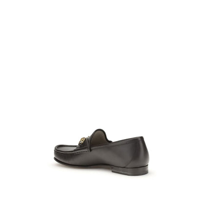 Gucci Brown Calf Leather Bos Taurus Slip-On Loafers with Horsebit detail, showcasing elegant design and craftsmanship.