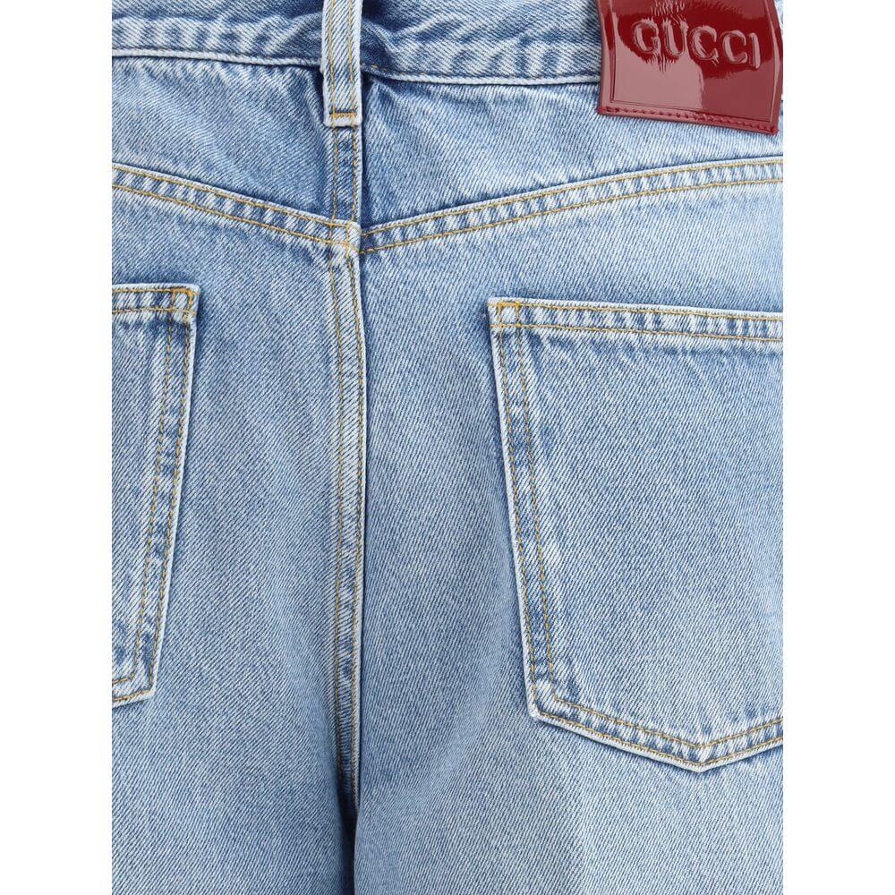 Back view of Gucci Light Blue Cotton Jeans Denim with square pockets and contrast stitching detail.