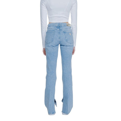 Back view of Guess Light Blue Cotton Mom Jeans with flare and split hem, highlighting the design and fit on a model wearing a white top.