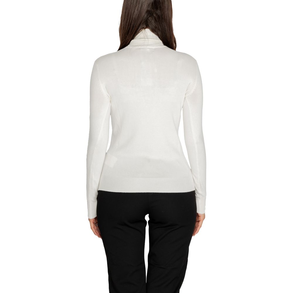Back view of Guess White Viscose Turtleneck sweater with long sleeves and high neck, combining style and comfort for women.