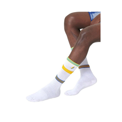 Happy Socks White Cotton Socks with colorful striped cuffs, worn by a person sitting.