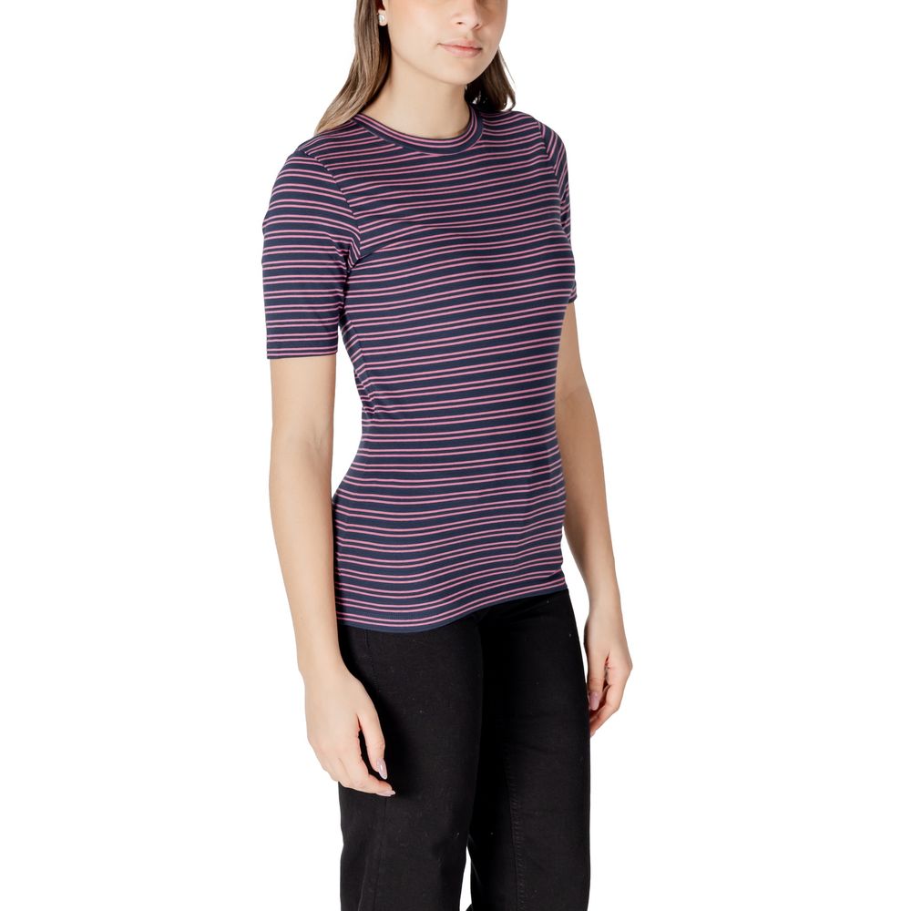 Woman wearing ICHI Bicolor Cotton T-Shirt with horizontal stripes and a crew neckline, showcasing a casual yet refined style.