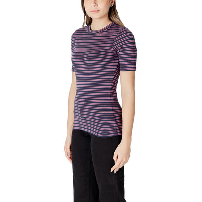 Woman wearing ICHI Bicolor Cotton T-Shirt with horizontal stripes and short sleeves, showcasing a casual yet elegant style.