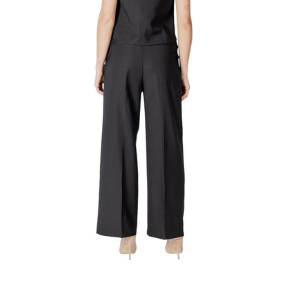 Model wearing ICHI Black Polyester Pant with sophisticated palazzo style and elegant wide-cut design.