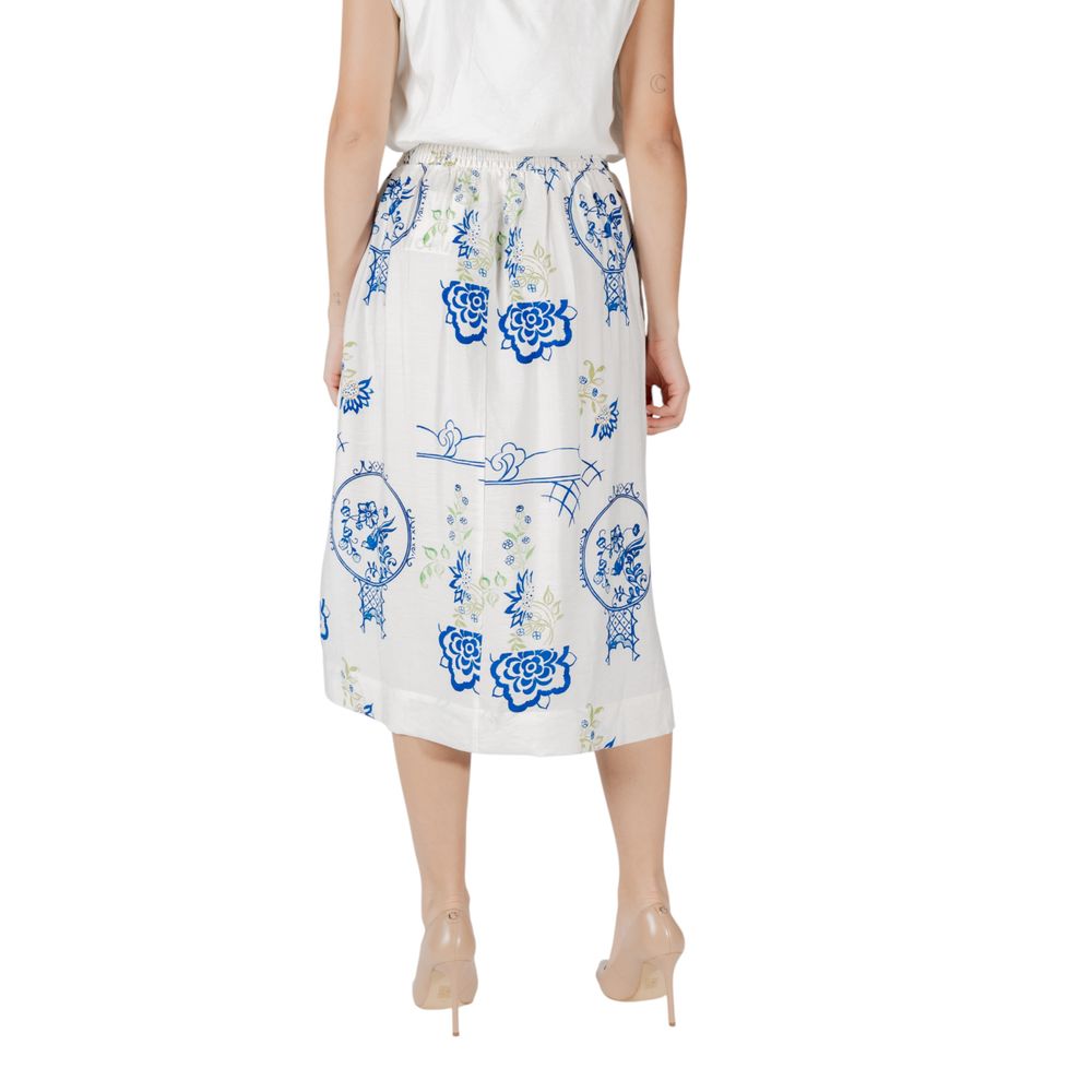 Back view of ICHI White Viscose Skirt featuring blue floral design on a woman