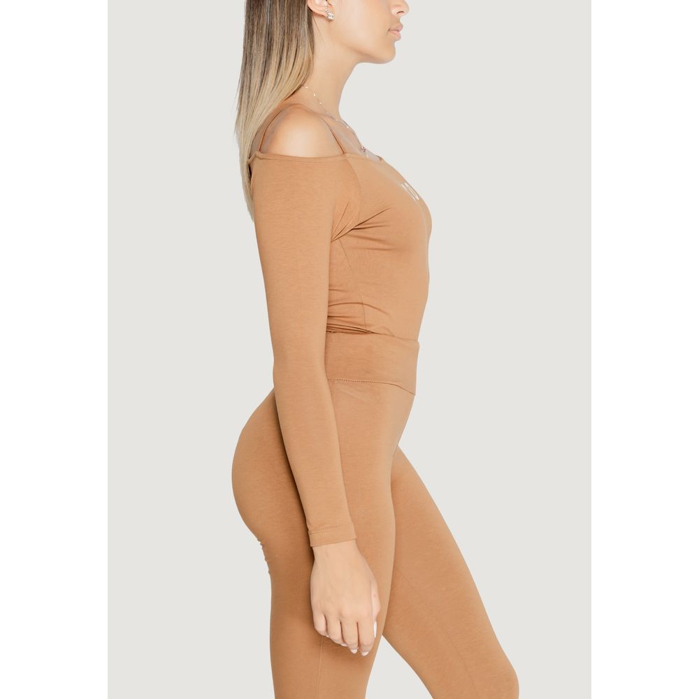 Woman wearing Icon Brown Cotton Bodysuit, side view showing long sleeves and slim fit design.